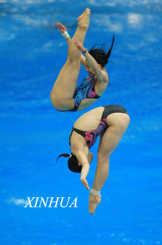 فريق الغطس الصيني يتمرن فى مركز السباحة الوطنى استعدادا للاولمبياد