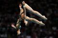 图文-跳水女子双人10米台决赛 朝鲜选手空中翻腾