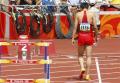 图文-刘翔因伤退出110米栏比赛 刘翔离开赛场