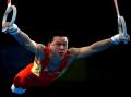 图文-奥运会男子体操资格赛开战 黄旭身姿舒展