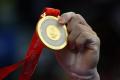 图文-奥运会体操男子吊环决赛 奥运金牌细节特写