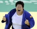 图文-[奥运]女柔78公斤以上级 佟文夺冠喜极而泣