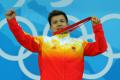 图文-男子举重62公斤级比赛 张湘祥奥运夺金