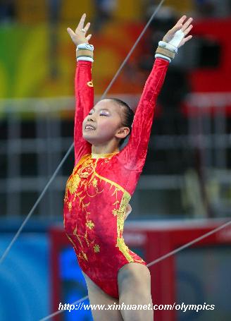 Chinese girls claim first Olympic gymnastics team crown