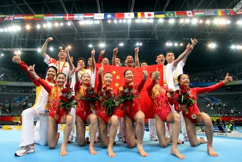 Photo: Chinese women's gymnastics team celebrates