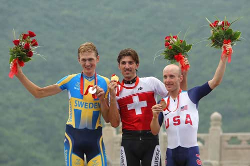 Photo: Cancellara of Switzerland wins Men's Cycling Time Trial gold