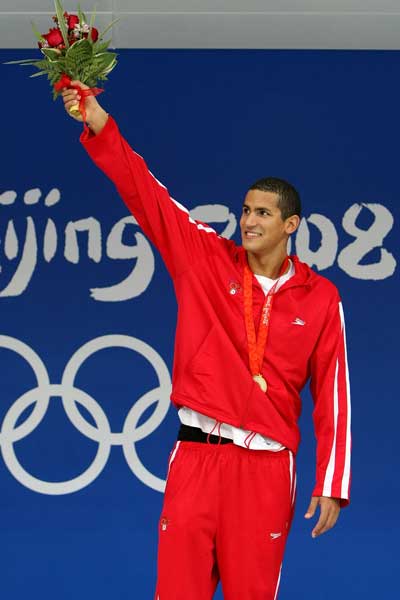 Photos: Tunisian Mellouli wins Men's 1,500m Freestyle Olympic gold