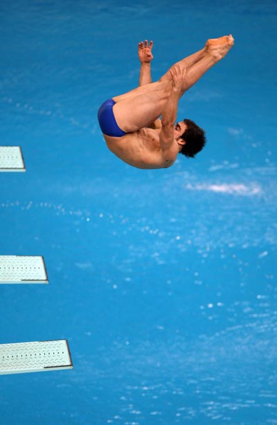 Photos: He Chong claims China's sixth Diving gold