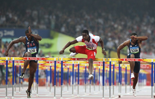 Photo: Cuba's Robles wins Men's 110m Hurdles gold