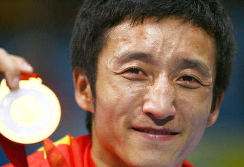 Photo: Zou Shiming of China wins 48kg Boxing gold medal