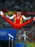 图文-奥运竞技体操项目精彩回顾 双杠超人