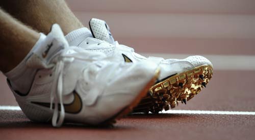 图文-奥运会男子200米预赛 金光闪闪的战靴