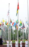 图文-几内亚比绍代表团升旗仪式 国旗飘扬广场之上