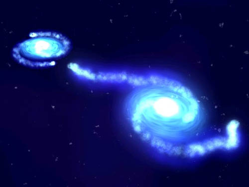科技时代_星系间碰撞促使黑洞疯狂吞噬气体和灰尘(图)