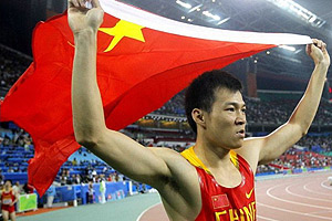 中国首夺亚运男子百米金牌