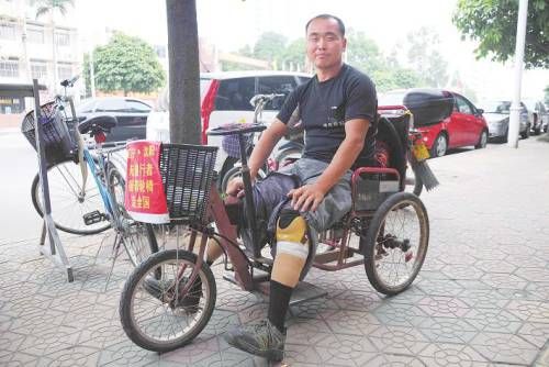 为梦摇轮椅走中国 “无腿行者”南宁感受爱与祝福