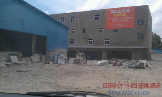 图为烂尾20年的危楼被粉饰一新后公然招租。中国经济网深圳频道摄