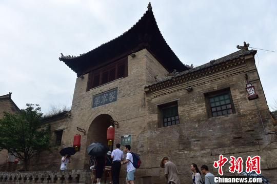图为上庄村内的天官王府,府门上写有“冢宰第”。 主办方供图 探访中国民居第一村:古代高官私宅8道机关防盗