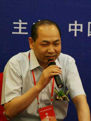 图文:人力资源和社会保障部工资司司长邱小平