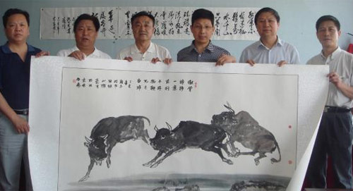 画家张继山再向中国扶贫开发协会捐献书画作品