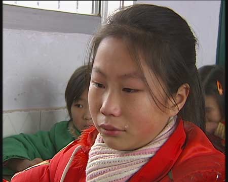 组图:父母到海口打工8年未见 留守儿童令人心