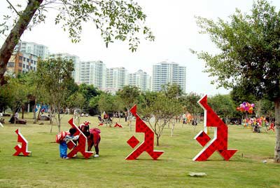 福建安溪七巧运动造型绘就书法奥运