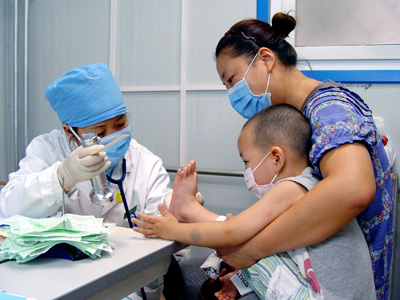 记奋战在手足口病麻疹等救治一线的北京医务人员