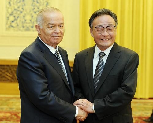 4月20日，全国人大常委会委员长吴邦国在北京人民大会堂会见乌兹别克斯坦总统卡里莫夫。新华社记者 刘建生 摄