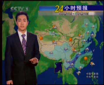 央视天气预报新主持人冯殊首次亮相(组图)