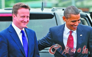 英首相卡梅伦搭商务机乘火车低碳访美(图)