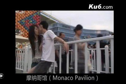 小情侣挑战吉尼斯纪录 148个展馆前接吻