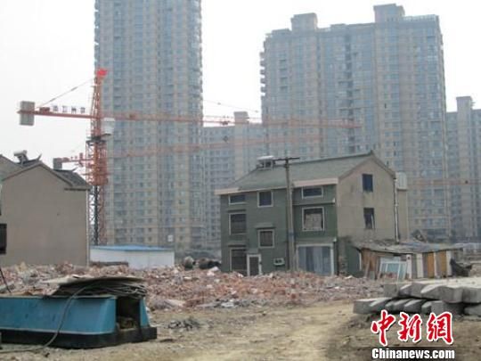 法院文书频频出错楼盘6年“钉子户”遭强拆