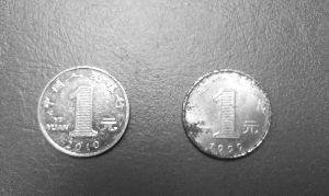 1元假硬币横行公交公司每月收上千枚