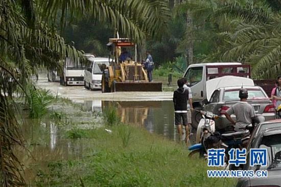 马来西亚水灾灾情恶化 约5万居民被疏散(组图