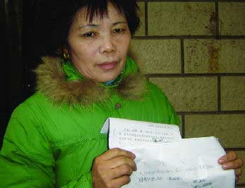 城管局欠商店2万多元烟酒钱不还(图)