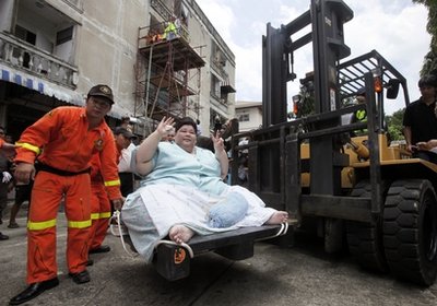 泰国274公斤女子求当局爆破房子让其通行(图)