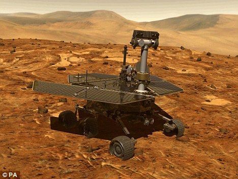 这是一幅电脑合成图像，显示的是勇气号在火星表面行驶时的摸样。如果到下个月仍然听不到回应，宇航局将不再尝试进行联系。资料图片