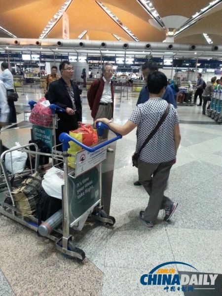 组图：马航MH370航班上中国画家失联前最后留影[1]-中国日报网