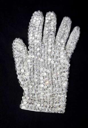 A custom-designed right-hand glove made of white spandex and covered in Swarovski crystal loch rosen crystals belonging to pop singer Michael Jackson is shown in this image released to Reuters in this February 17, 2009 file photo. [Agencies]
