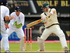 An Australian batsman and English fielders