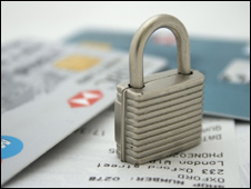 Credit cards, receipts and a padlock
