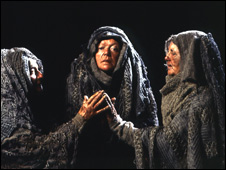 Actress Brenda Bruce as First Witch surrounded by the other two witches
