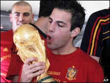Cest Fabregas holding the World Cup