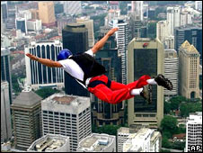 A man sky-diving into Kuala Lumpar, Malaysia