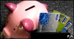 A piggy bank and credit cards