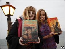 Girls carrying Harry Potter books