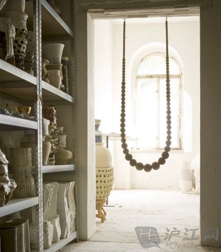 This handmade swing will act as a jewelry piece for your home.