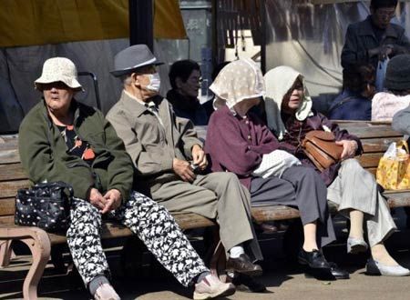 File picture shows a group of elderly people resting on a bench in Tokyo. Japanese researchers on Friday unveiled a population clock that showed the nation's people could theoretically become extinct in 1,000 years because of declining birth rates