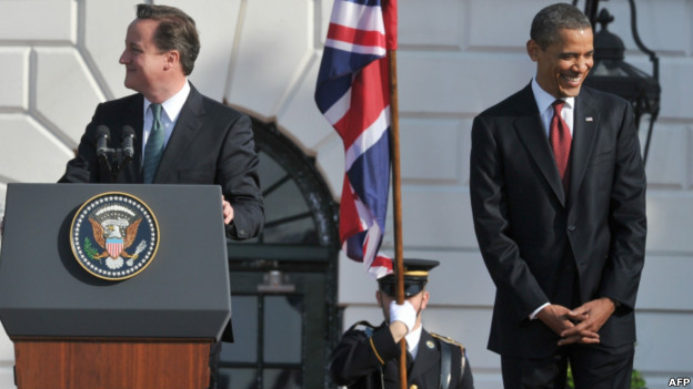 Barack Obama and David Cameron share a joke during a press conference.