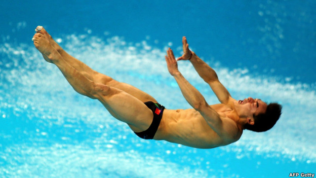 Qin Kai of China competes in the men's 3m springboard semi-final in the FINA Diving World Series 2012 in Dubai.